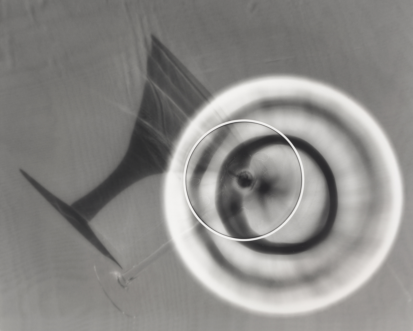 Tipsy martini glass, photogram on RC paper